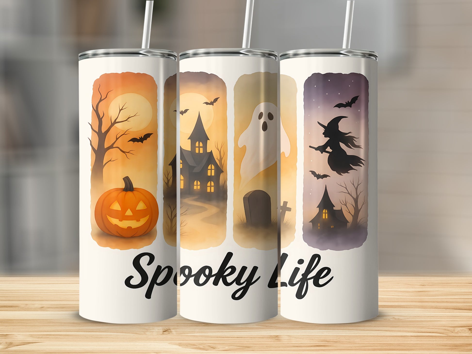 Three Halloween-themed tumblers with spooky scenes and the text "Spooky Life" on the base.