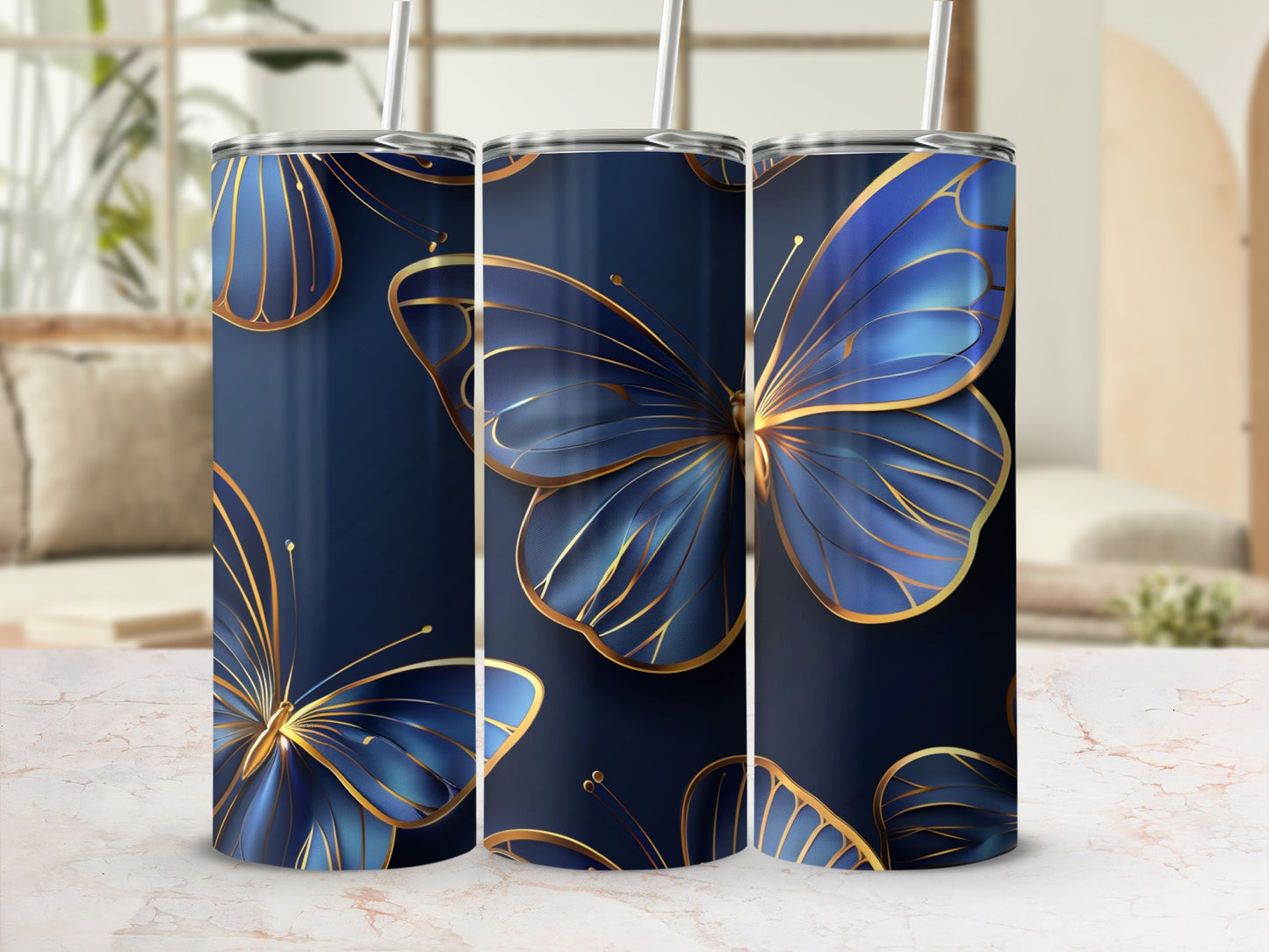 Tall navy tumbler with golden-lined blue butterflies and straw.
