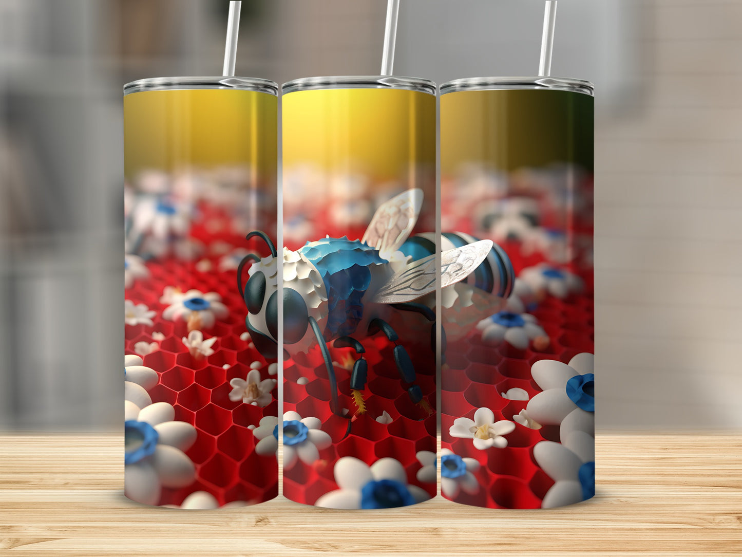 Three tumblers with a blue and white bee on a red honeycomb pattern with white flowers.