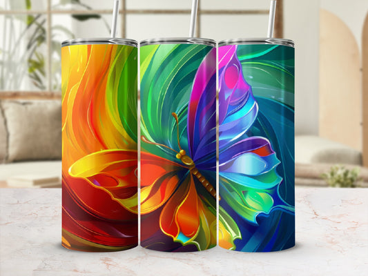 Three colorful tumblers with butterfly designs and straws.