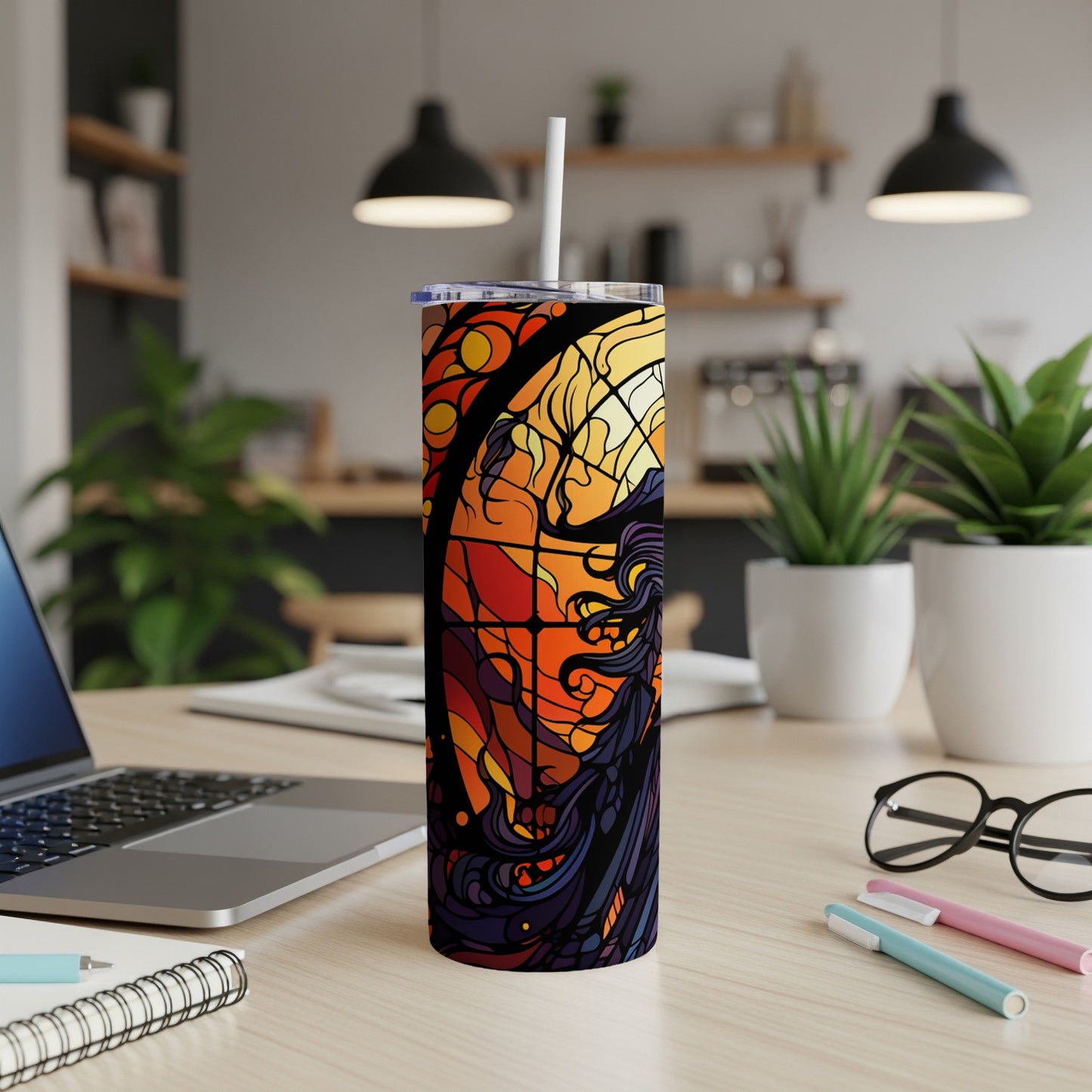 Stained glass-style tumbler with witch illustration and straw.