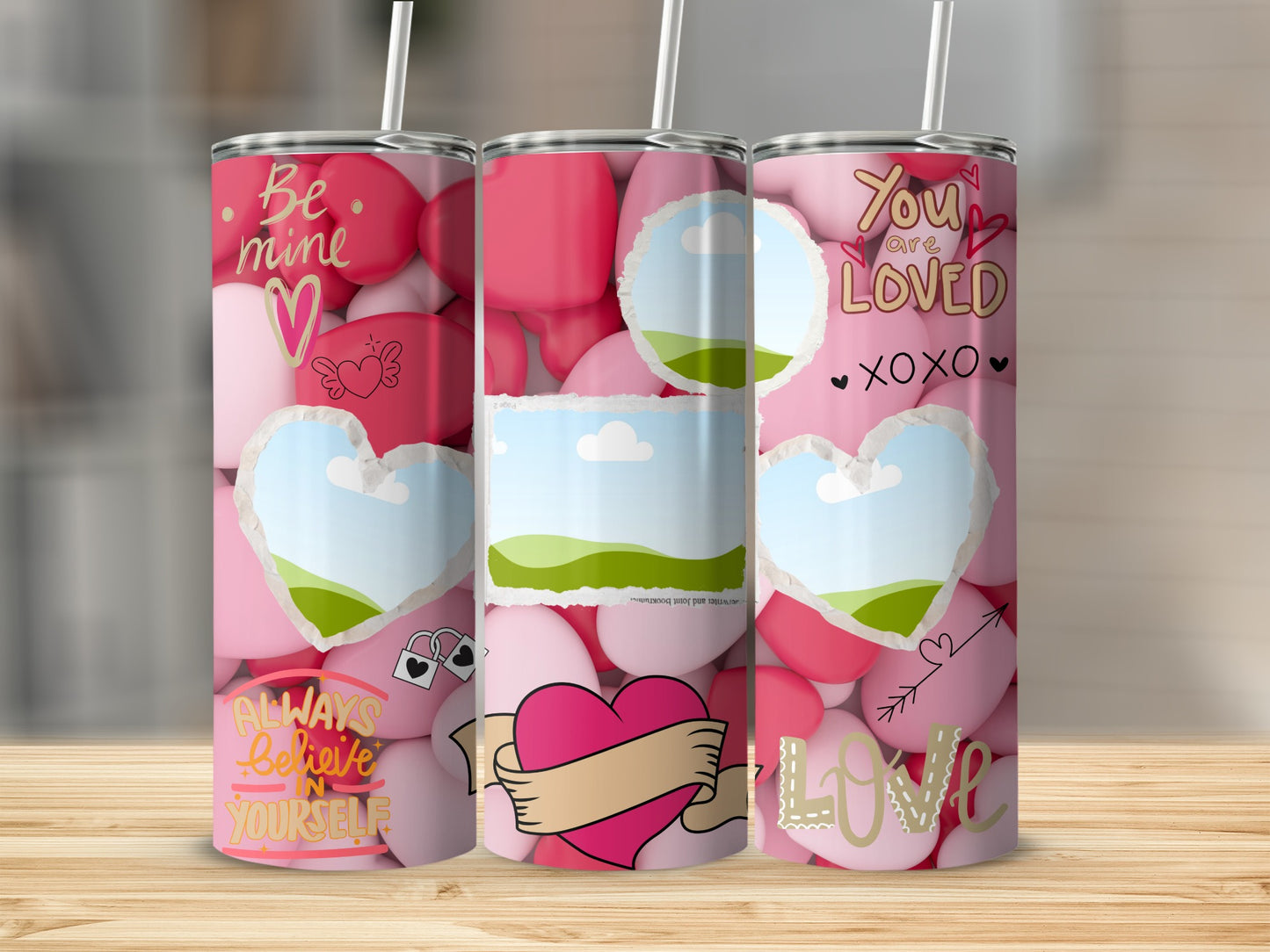 Three Valentine's themed tumblers with hearts and inspirational text.
