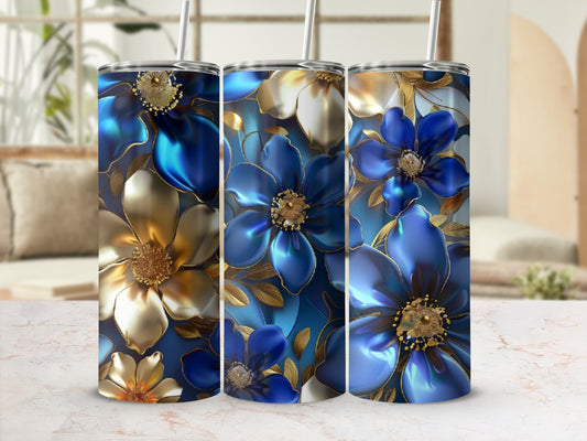 Three blue and gold floral tumblers with metallic accents.