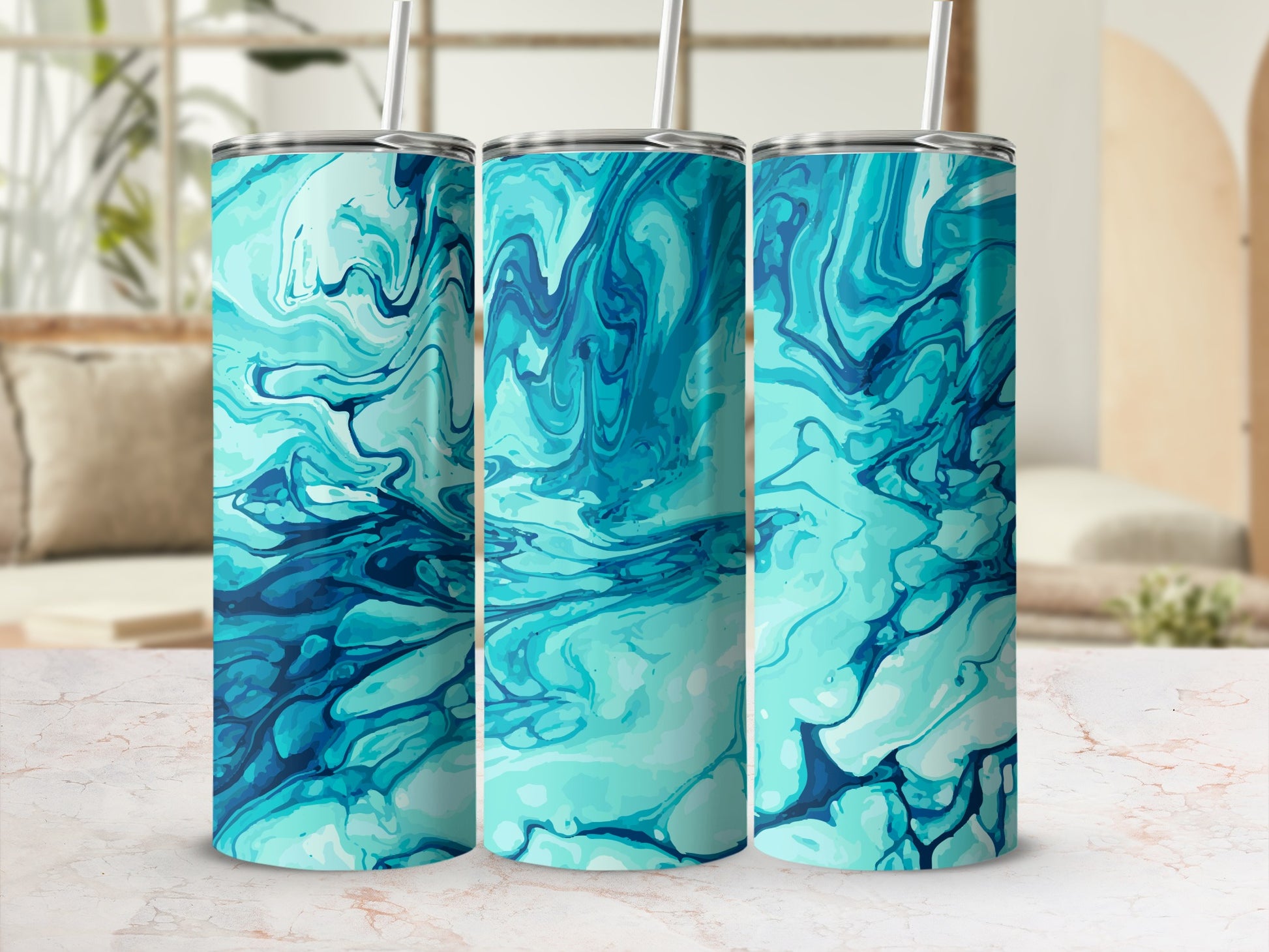 Three tumblers with a swirling blue and teal abstract pattern and metal straws.
