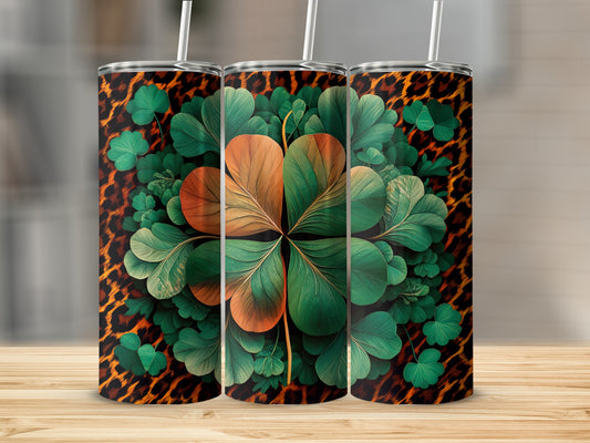Three tumblers with a clover and leopard print design.