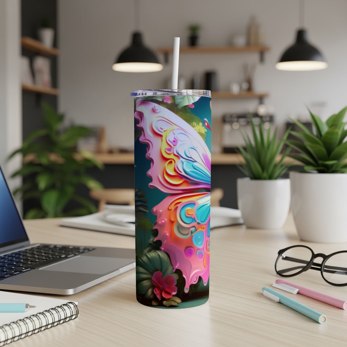 Tumbler with colorful butterfly design, tropical leaves, and flowers.