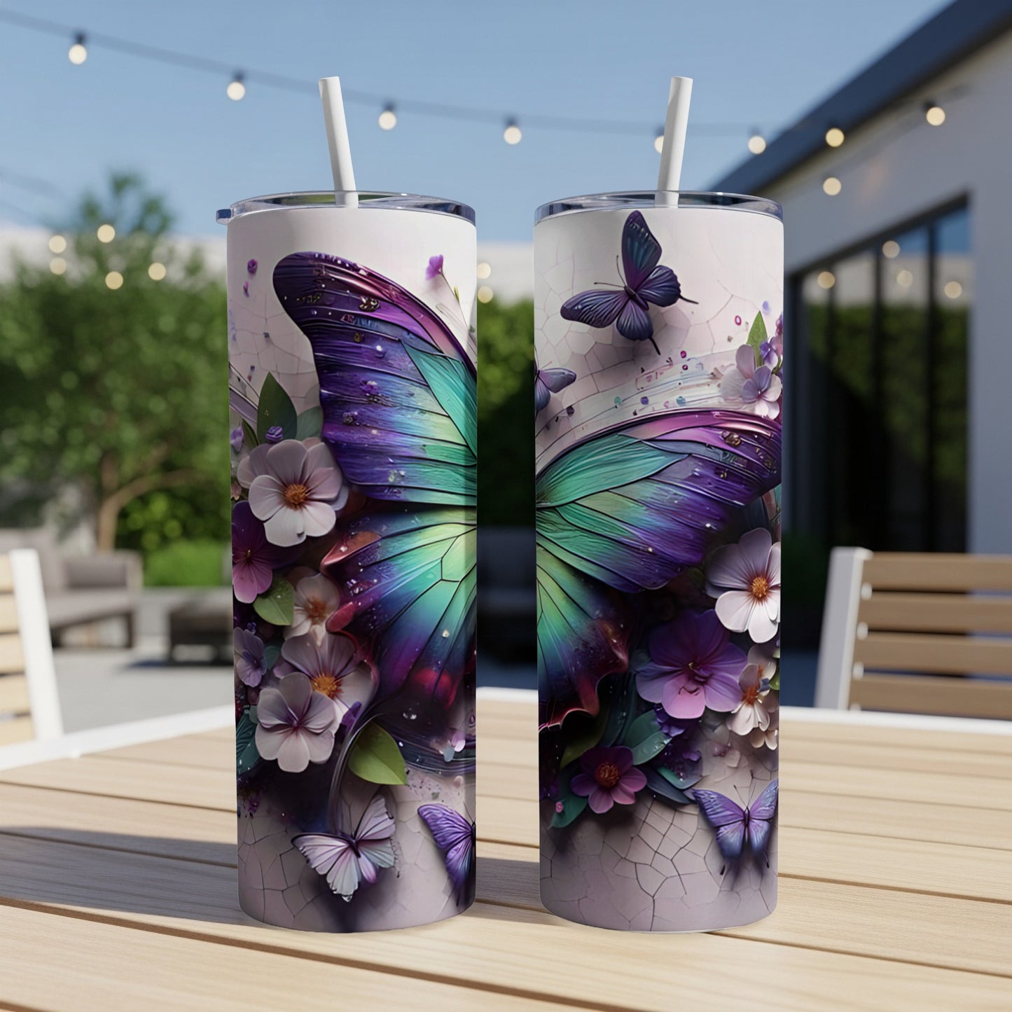 Two tumblers with iridescent butterfly and floral designs.