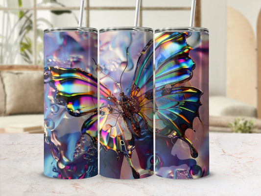 Iridescent butterfly tumbler with colorful wings against a blurred background.
