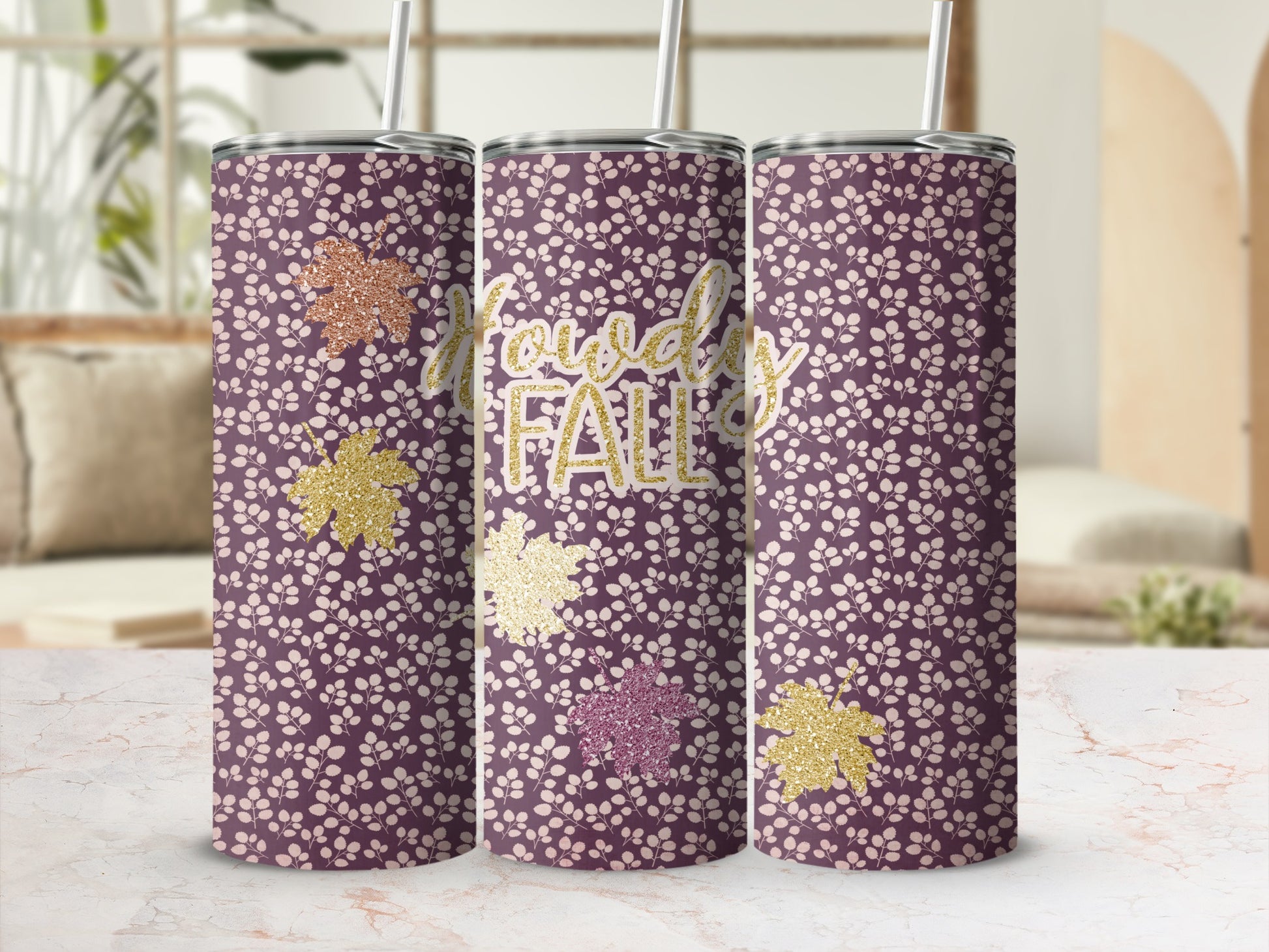 Purple tumbler with repeating leaf pattern and glittery "Howdy Fall" text.