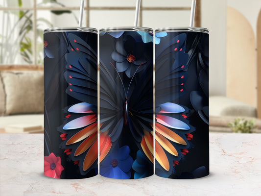 Dark butterfly with colorful wings on a tumbler, surrounded by flowers.