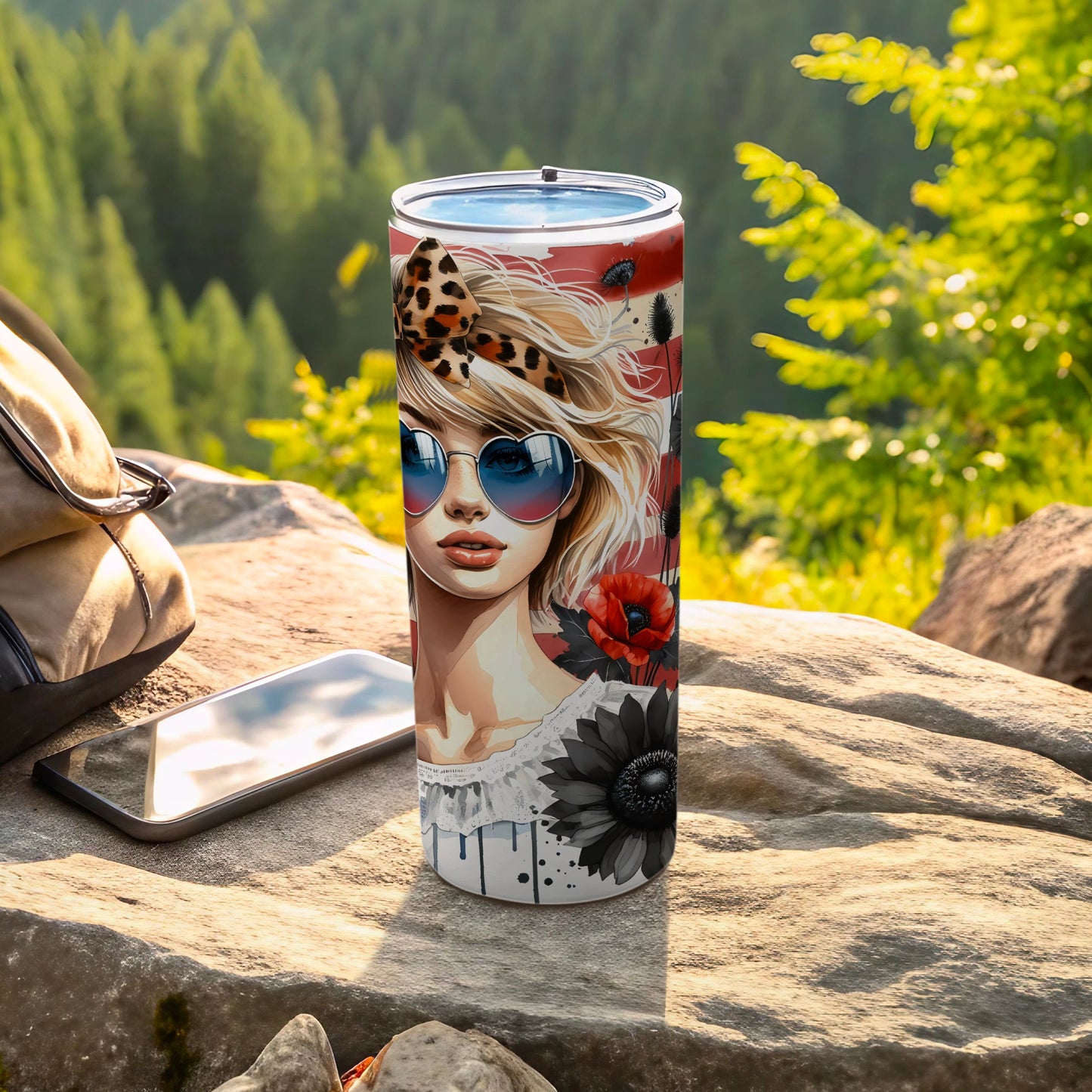 Tumbler with a blonde woman wearing sunglasses, poppies, and a sunflower.