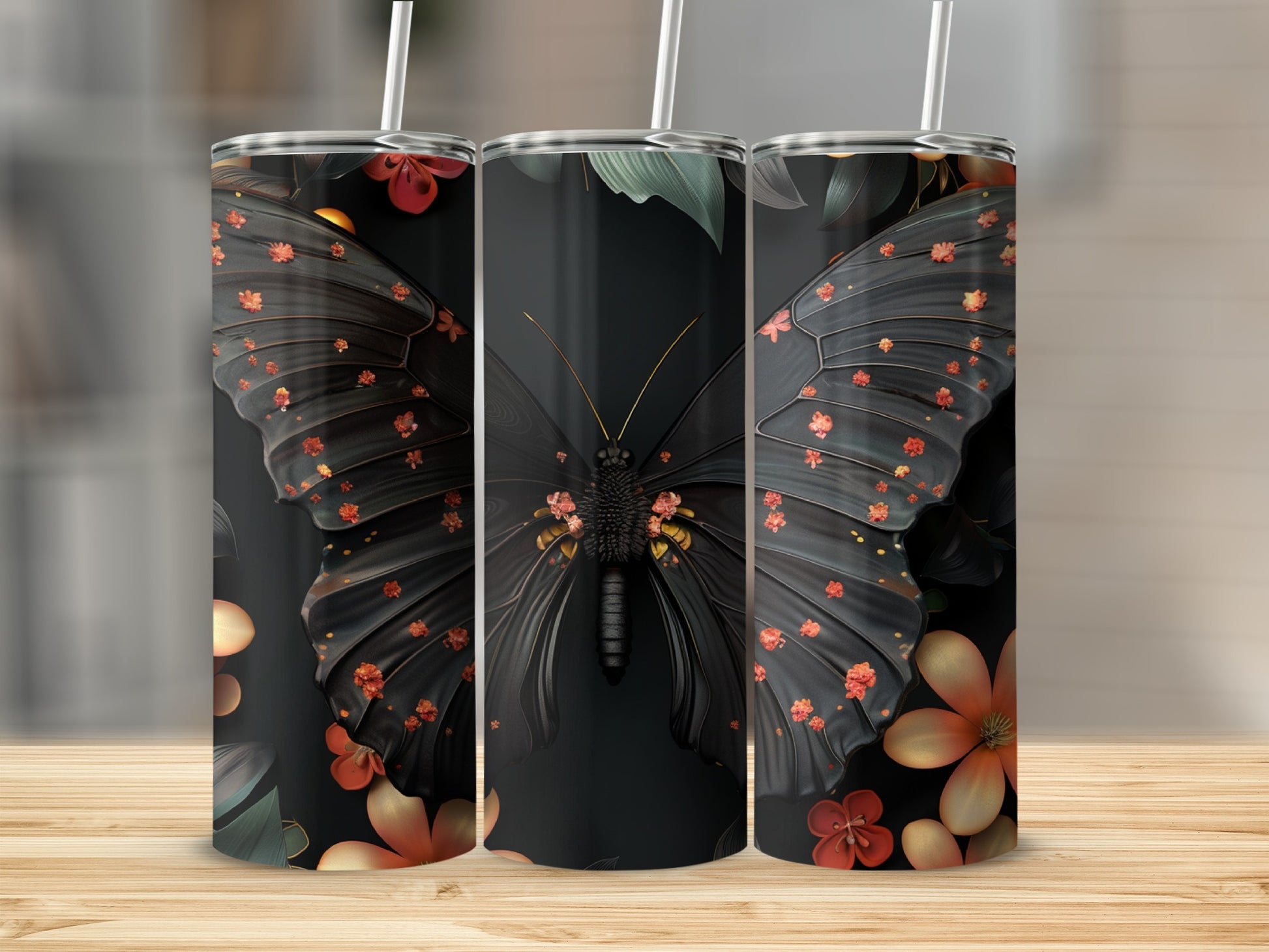 Black butterfly tumbler with floral accents on a wooden surface.