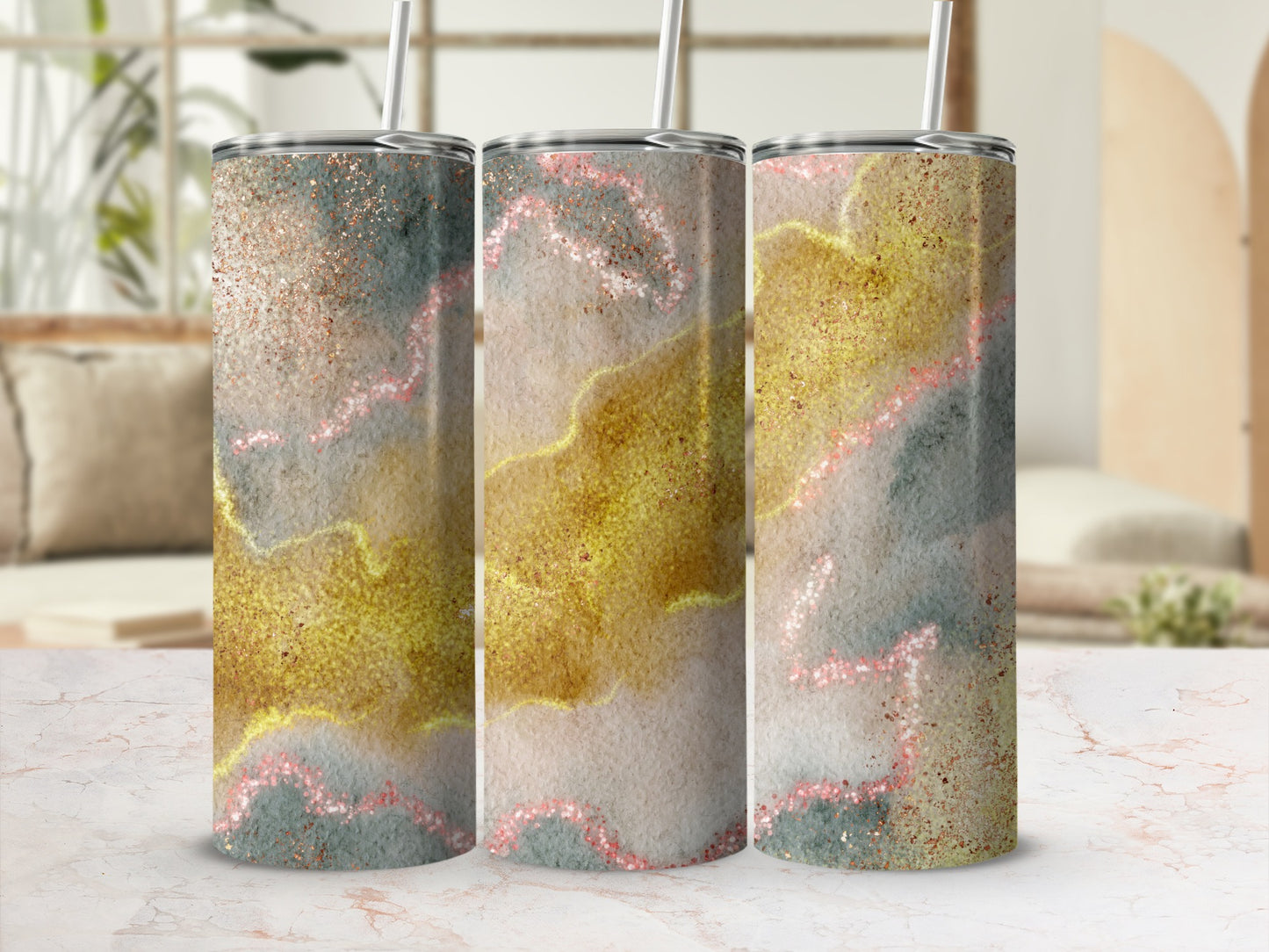 Three tumblers with a swirling glitter and watercolor design.