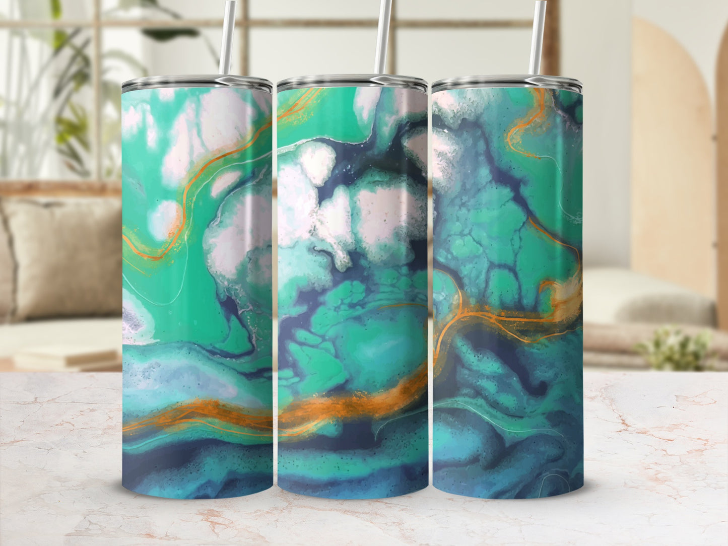 Three tumblers with marbled teal, blue, and gold abstract designs.