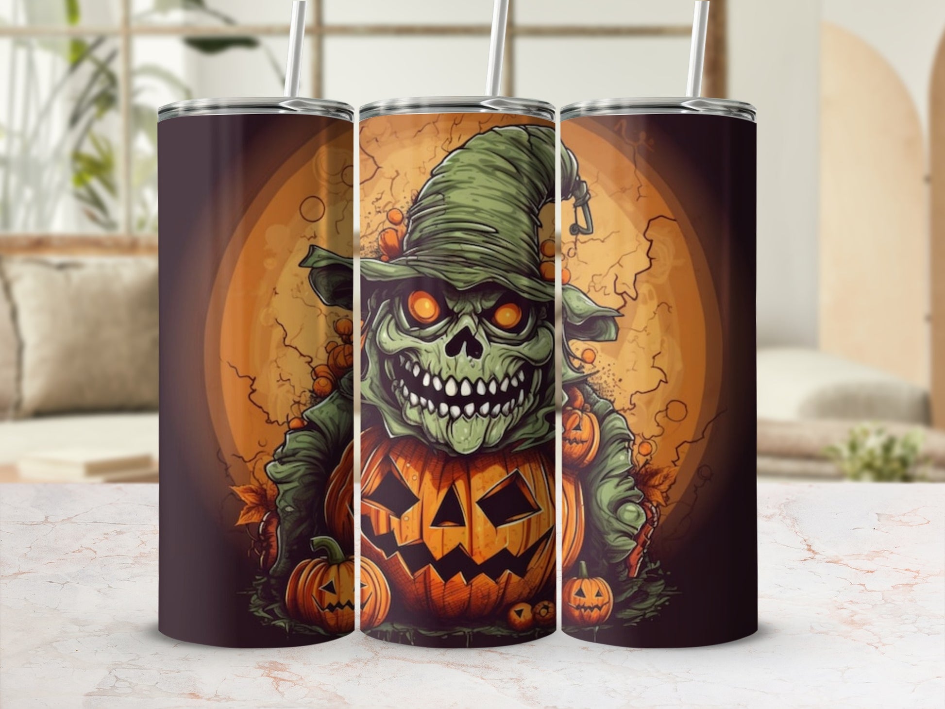 Halloween tumblers with a skull character wearing a witch hat and surrounded by pumpkins.
