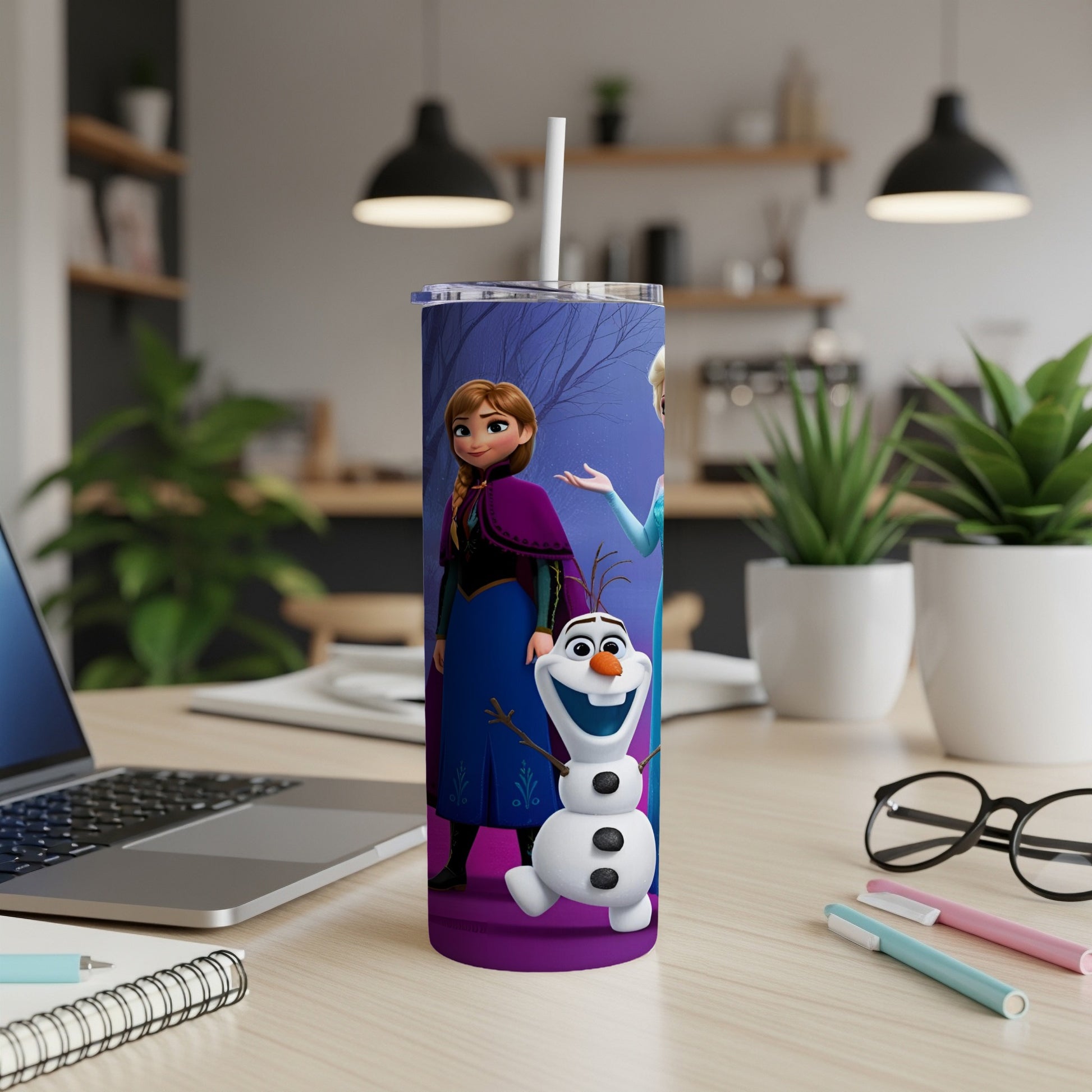 Elsa, Anna, and Olaf from Frozen on a purple tumbler with a white straw.