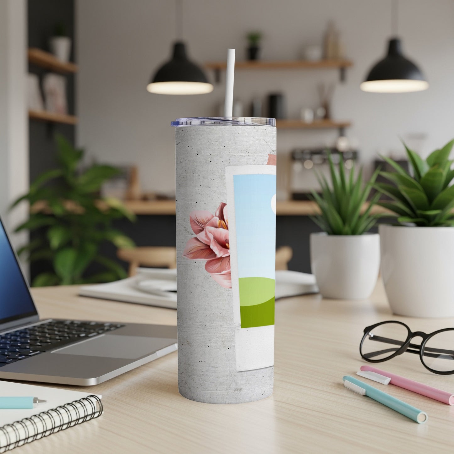Concrete tumbler with pink flower and landscape photo decal, straw in lid.