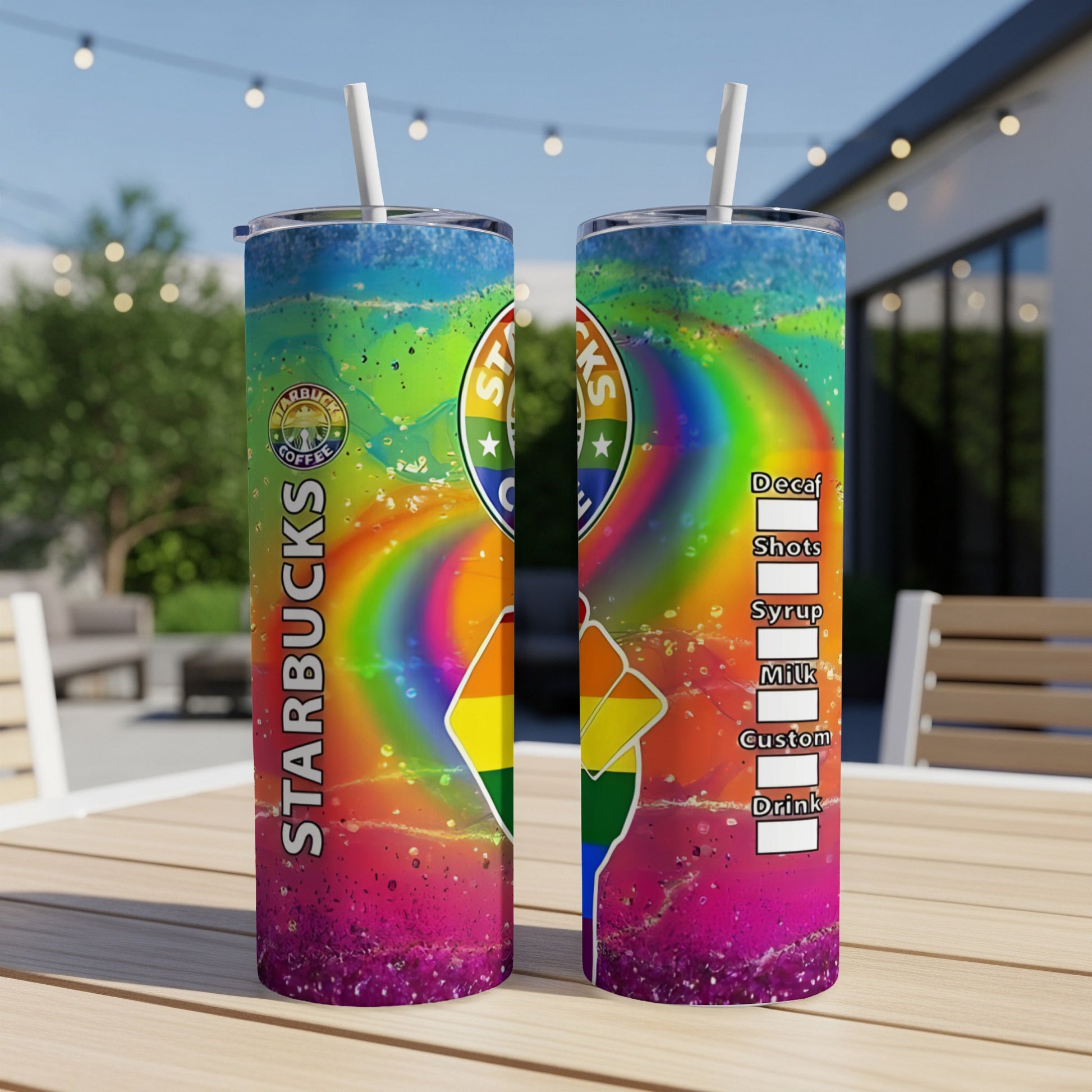 Tumbler with rainbow, Starbucks logo, and fist design.