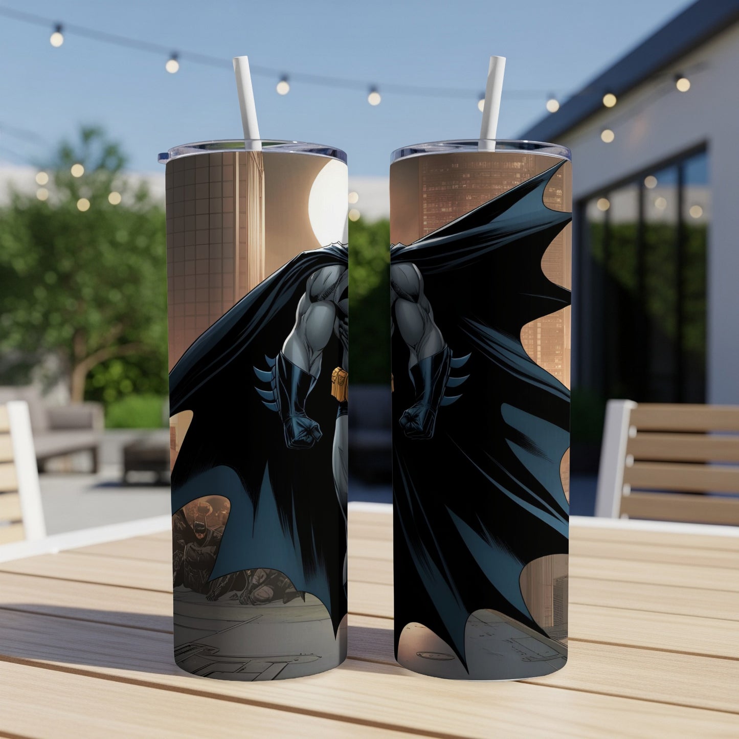 Two Batman tumblers display the Dark Knight standing against a city skyline.
