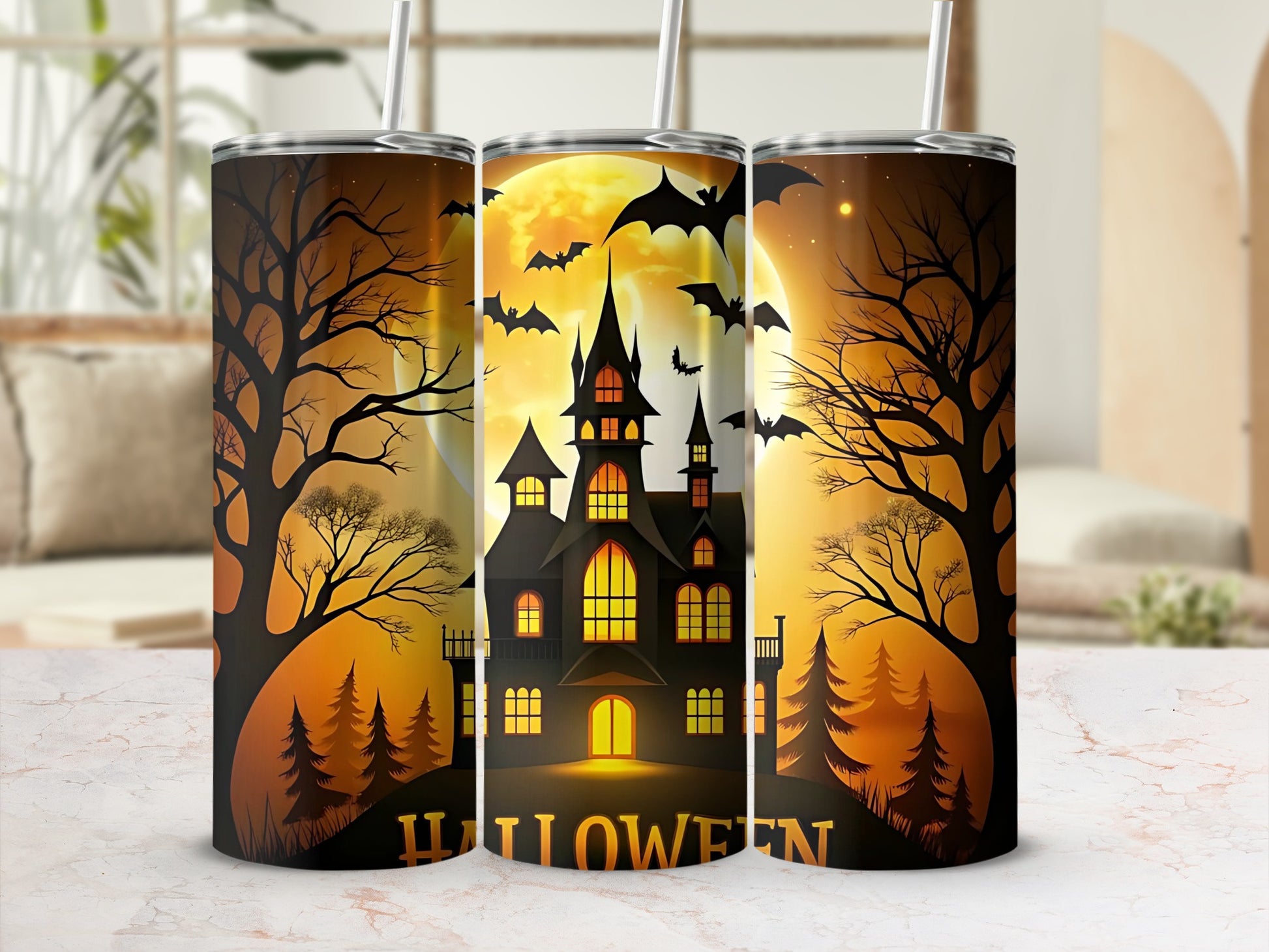 Halloween tumblers with spooky haunted house, bats, and trees under a full moon.