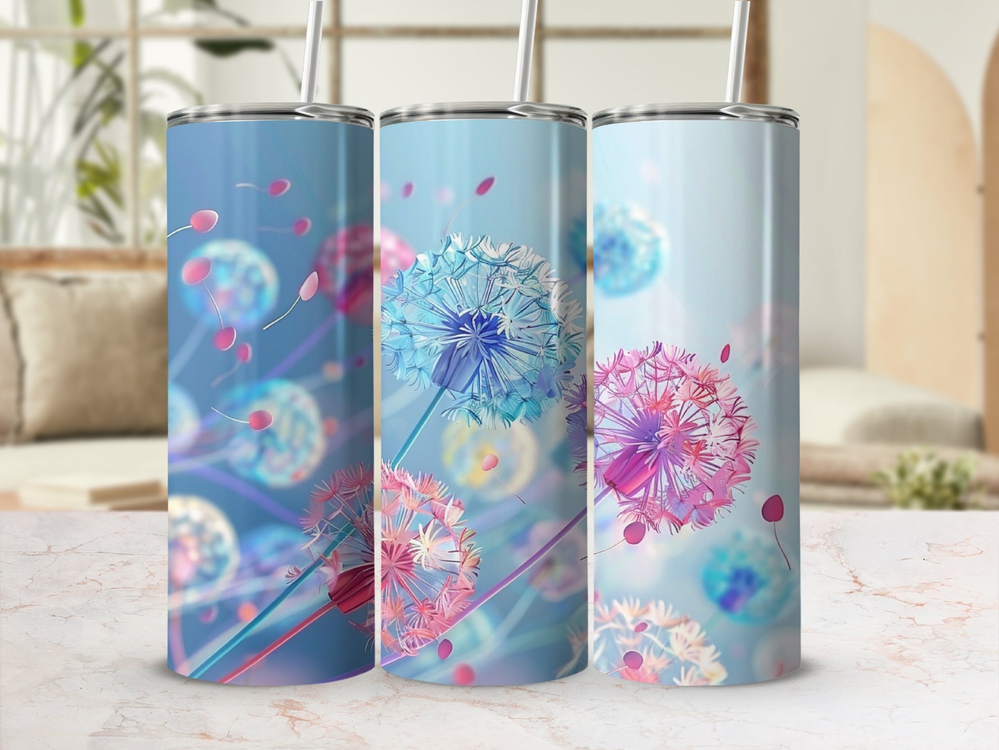 Three tumblers with floral dandelion designs in blue and pink.
