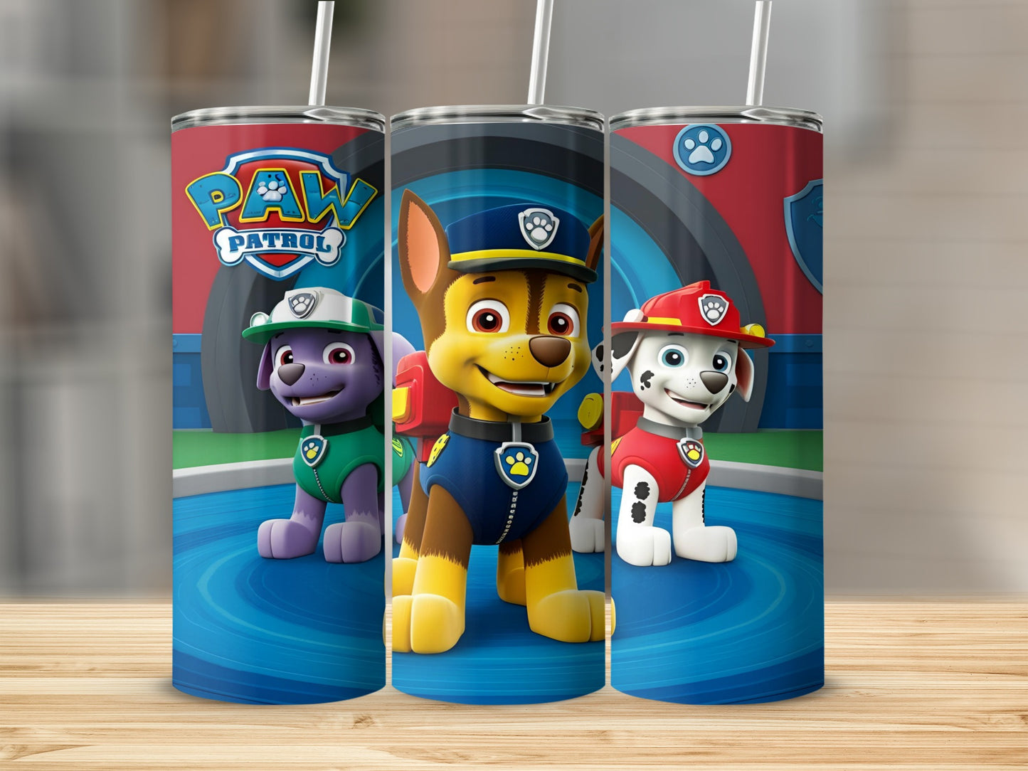 Three Paw Patrol tumblers featuring Chase, Marshall, and Rubble in cartoon style.