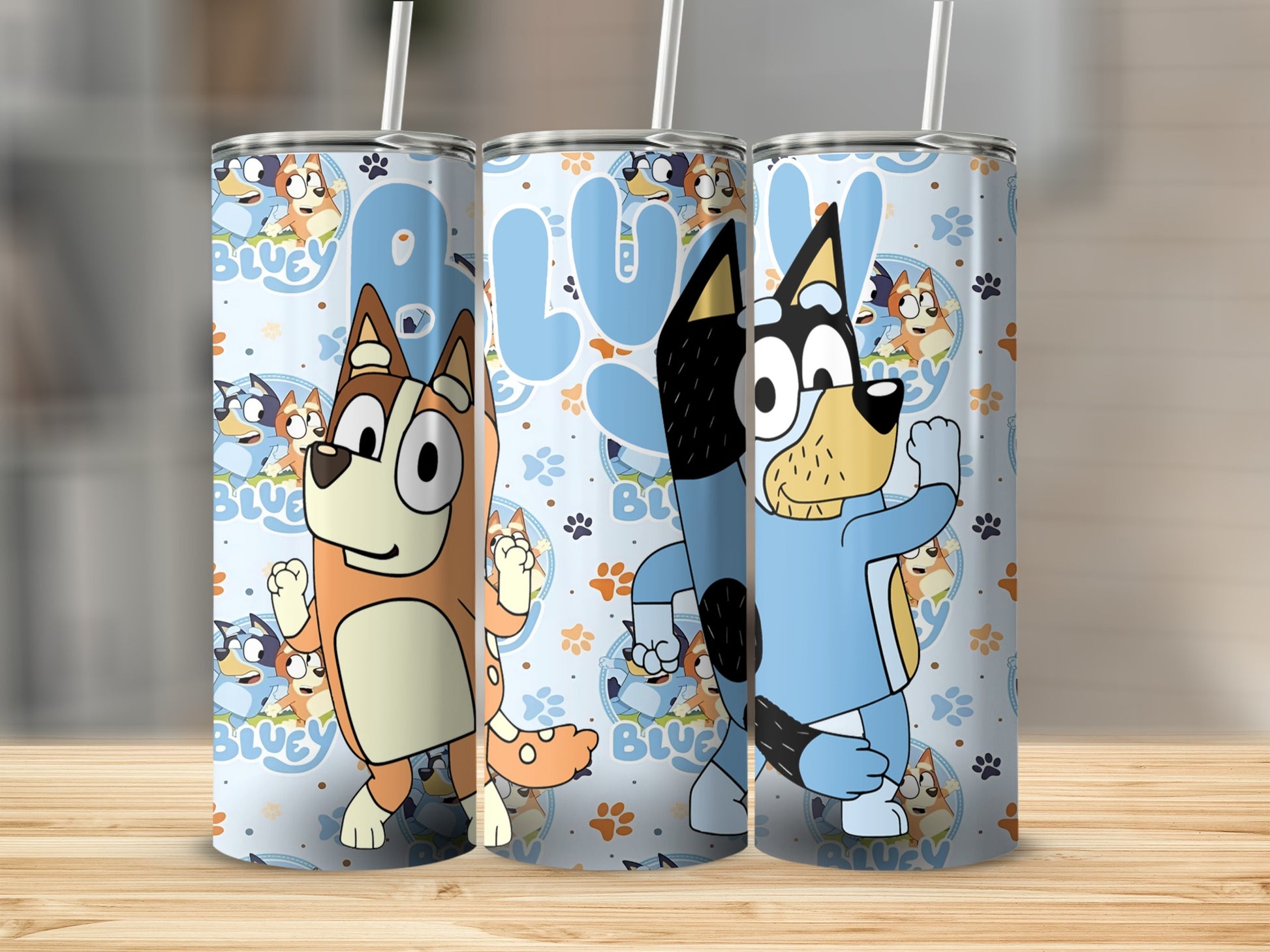Bluey and Bingo characters on a blue background with white paw prints and blue text.