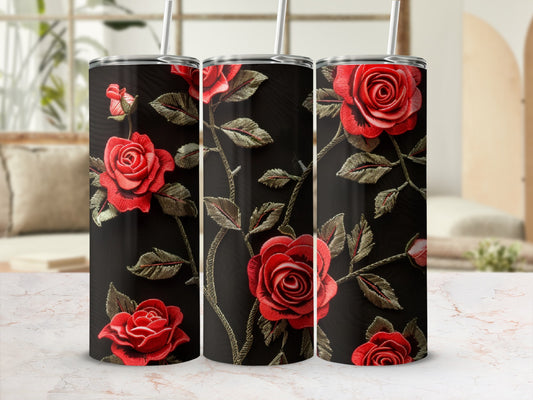 Three tumblers with a red rose and vine pattern on a black background.