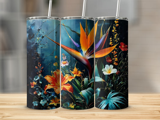 Floral tumbler with a vibrant bird of paradise flower and tropical foliage.