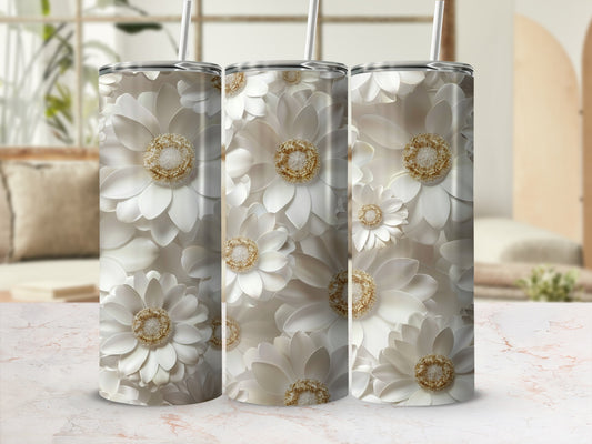 Three tumblers featuring white floral patterns with gold accents.