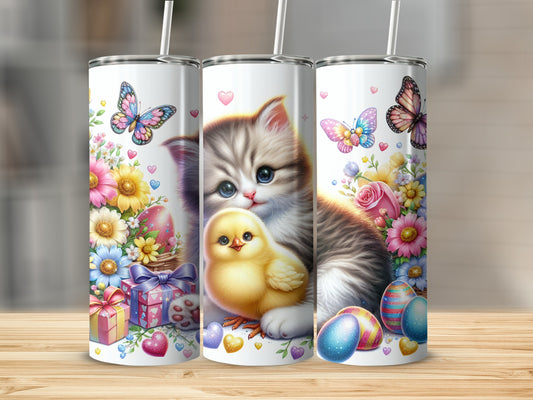 Easter tumbler with kitten, chick, butterflies, and decorated eggs.