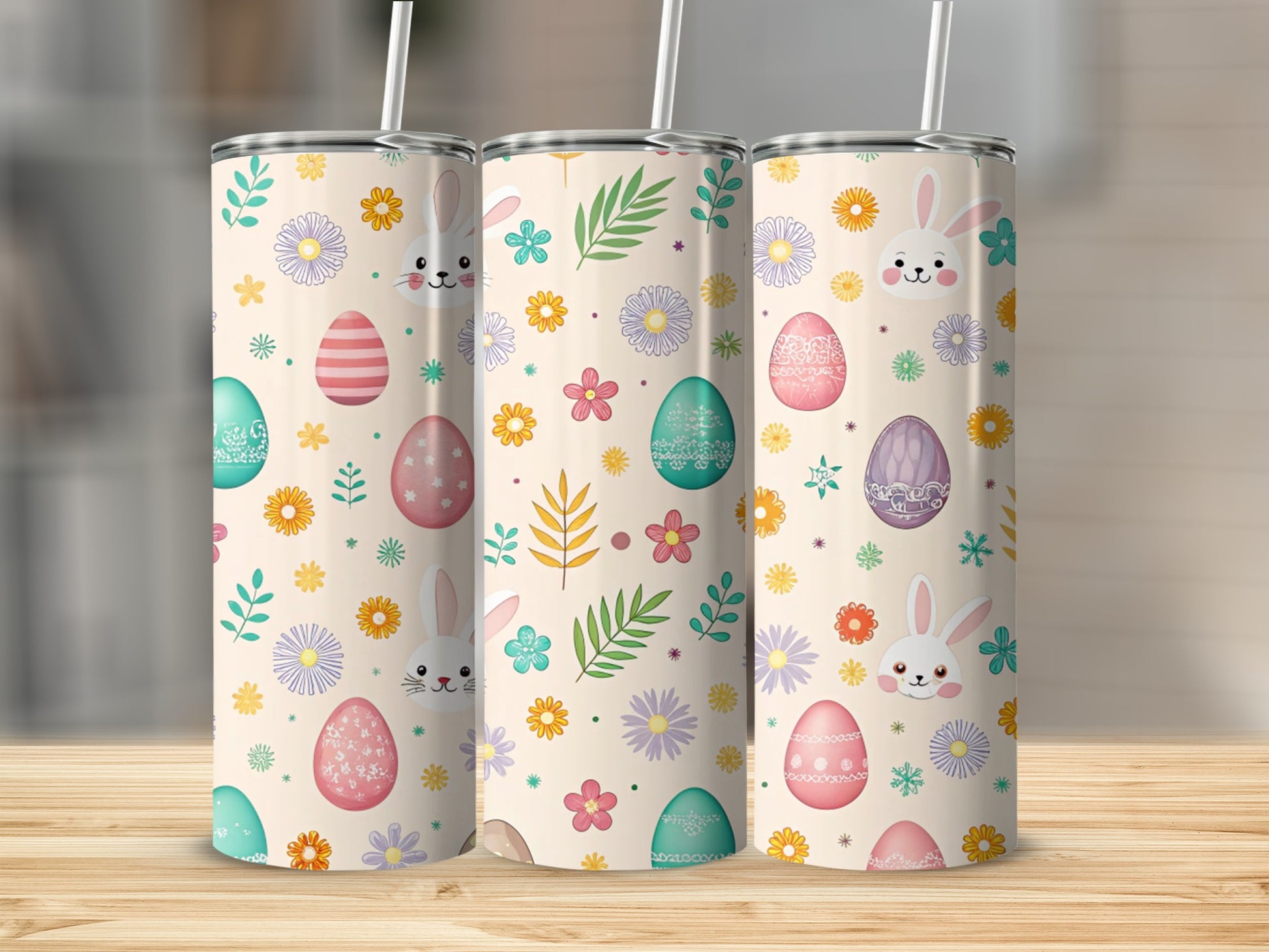 Easter-themed tumblers with bunnies, eggs, and flowers in pastel colors.
