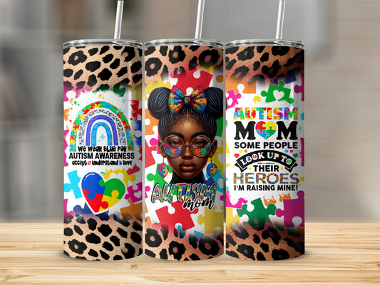 Three tumblers with leopard print, autism puzzle pieces, and text about autism awareness.