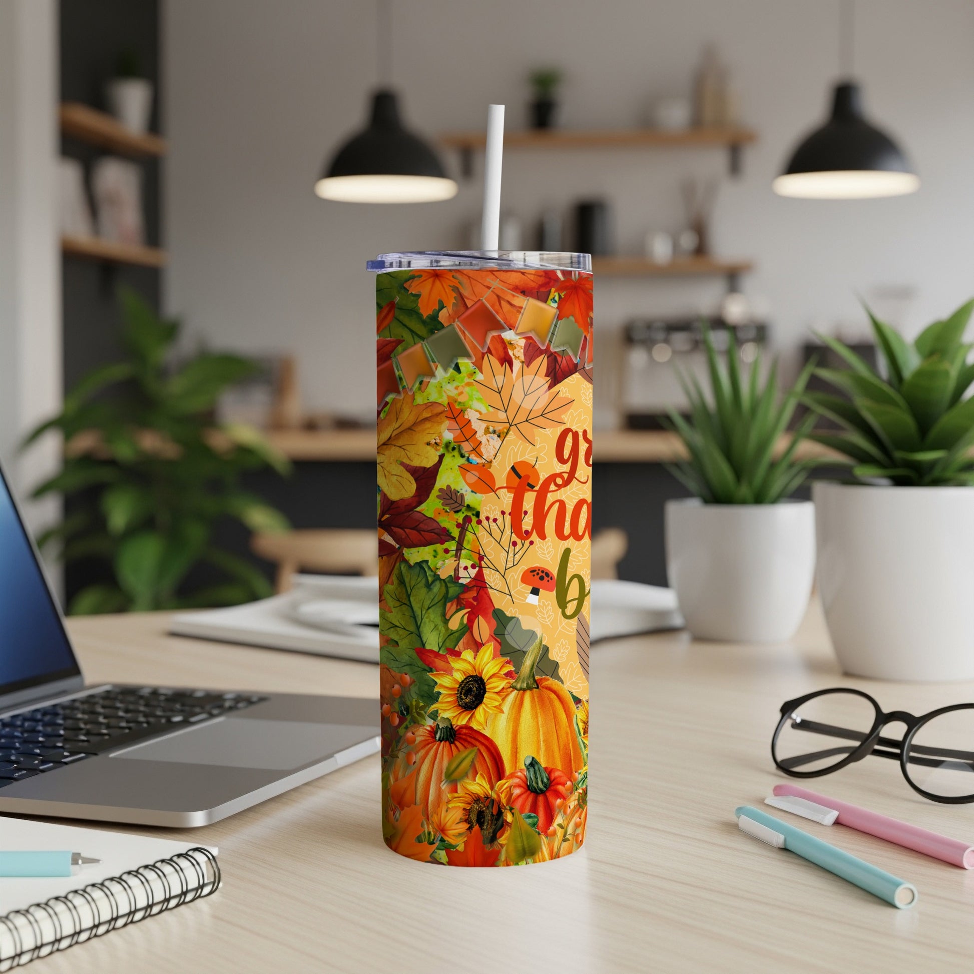 Tumbler with fall leaves, pumpkins, and sunflowers, reads "Grateful Thanks".