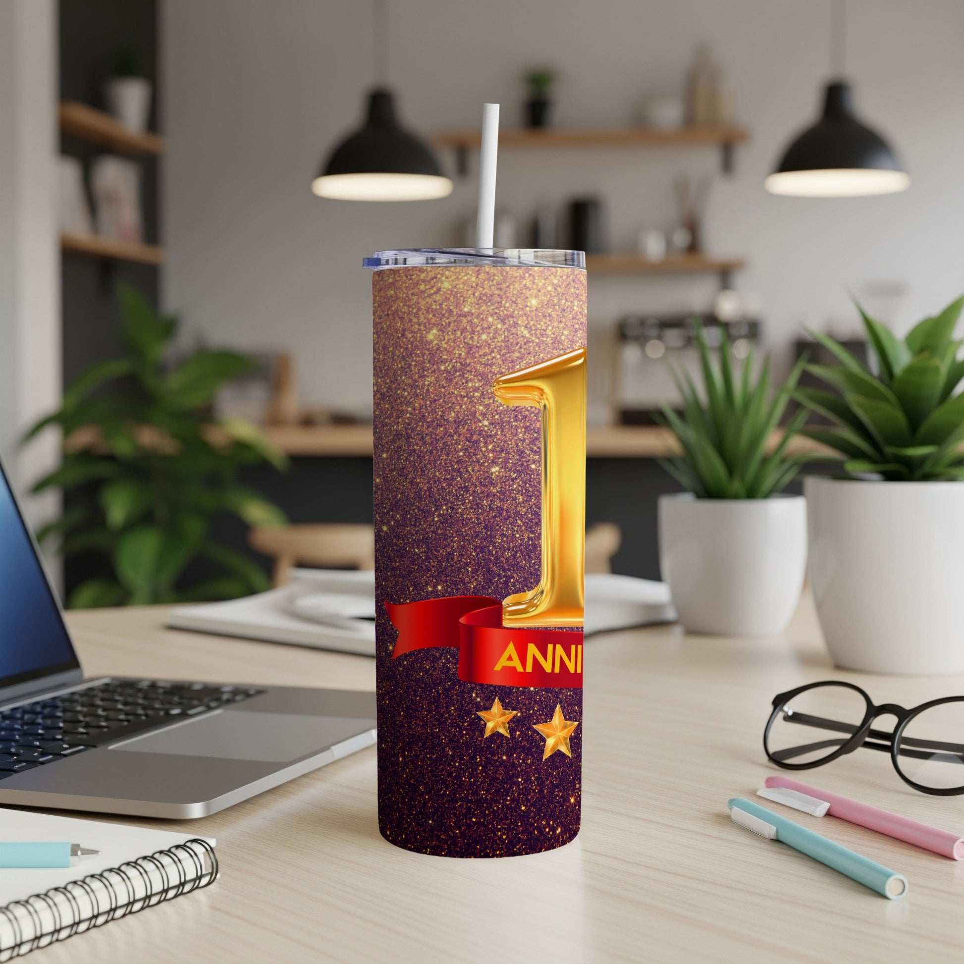 Gold "1" and "Anniversary" text on a glittery purple tumbler with red ribbon.