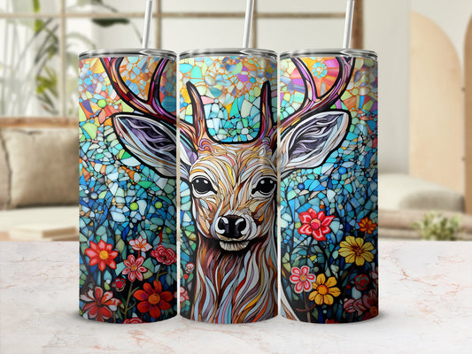 Deer head and floral pattern on a tall, colorful tumbler.