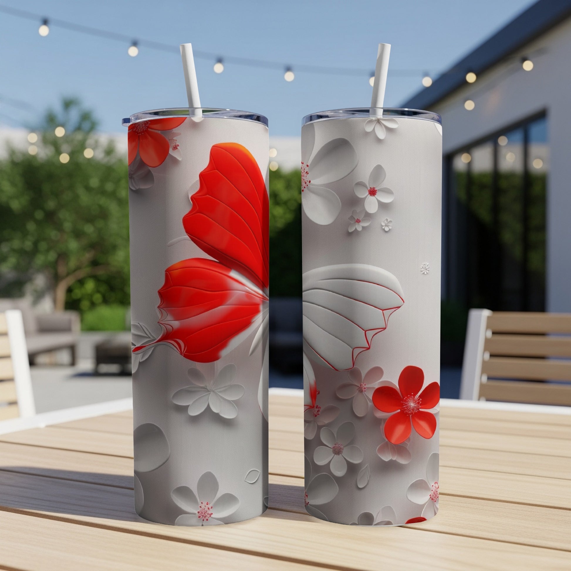 Two white tumblers with a large red and white butterfly design.