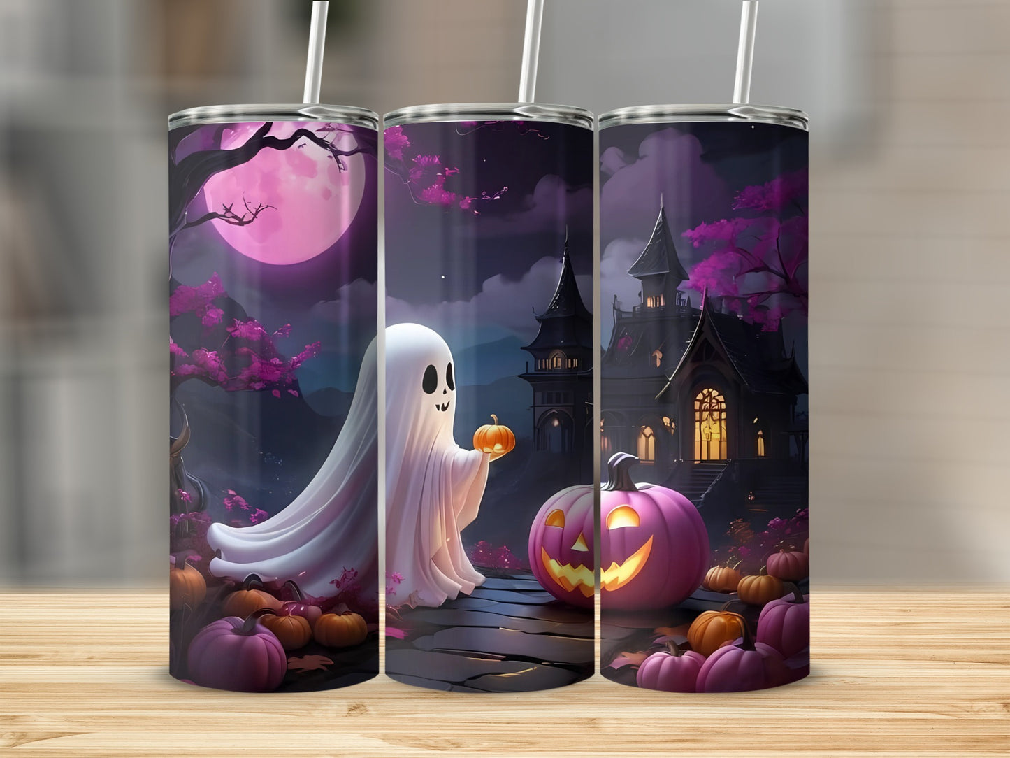 Three tumblers feature a Halloween scene with a ghost, haunted house, moon, and pumpkins.