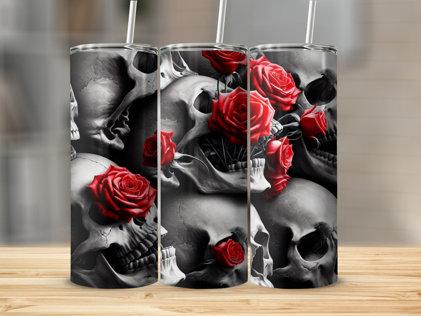 Skulls and red roses design on a cylindrical tumbler with straws.