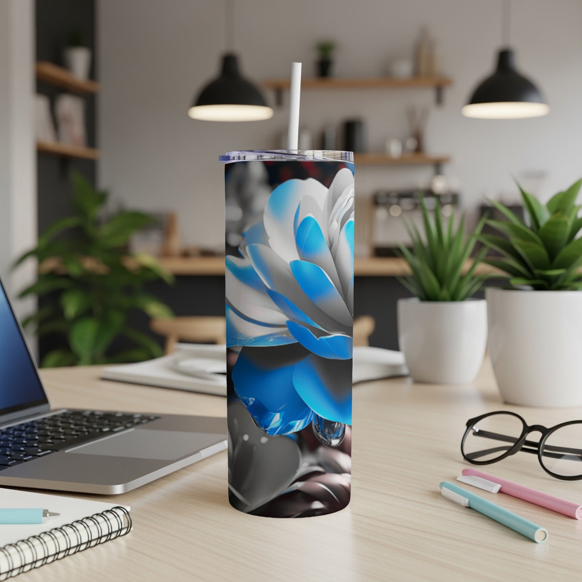 Tall tumbler with a close-up blue and white flower design.