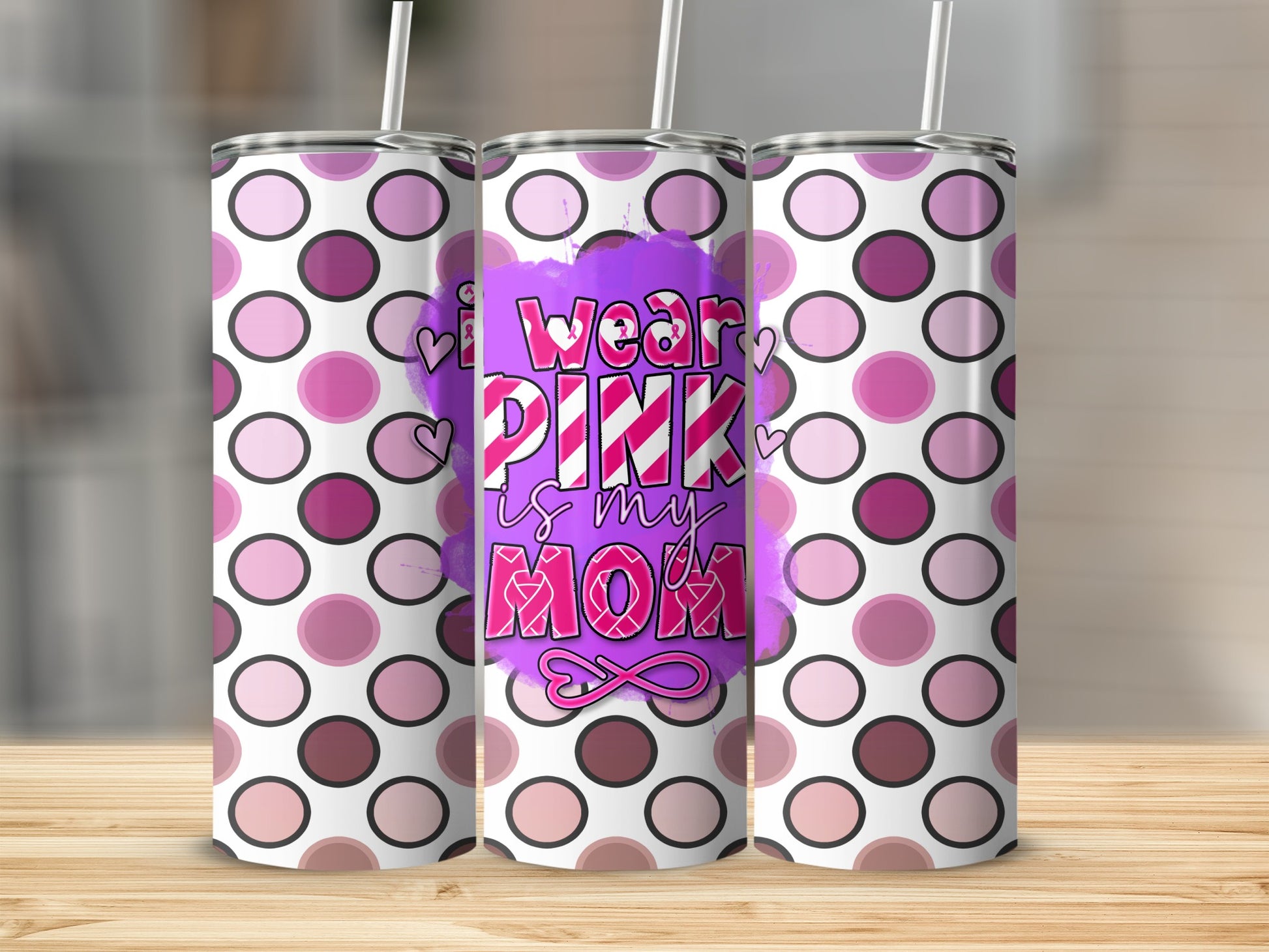 Tumbler with "I wear pink is my mom" text and pink polka dots.