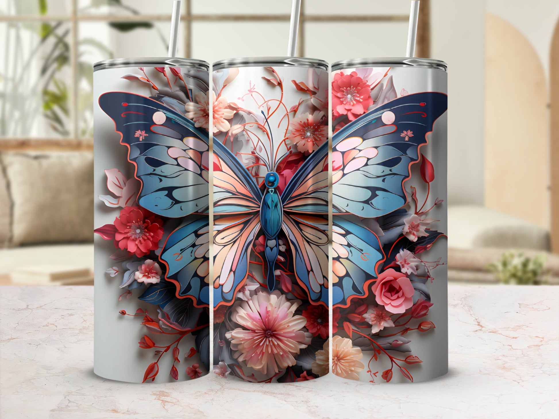 Three tumblers with a blue butterfly and floral design.