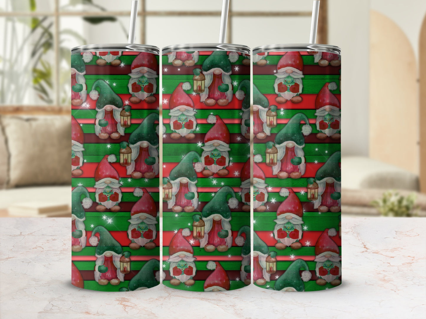 Three tumblers with a gnome and red stripe pattern.