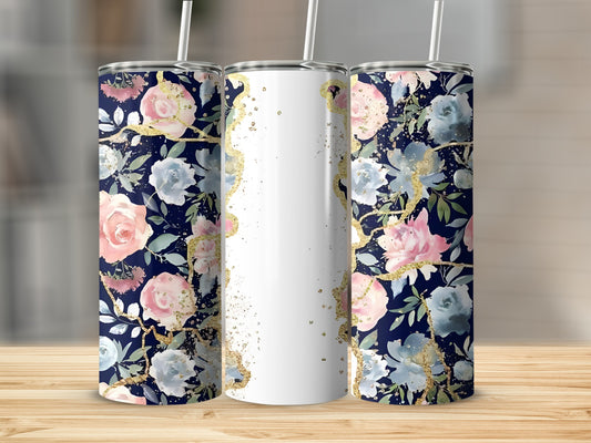 Three tumblers with a dark blue floral pattern and gold accents on a wooden surface.