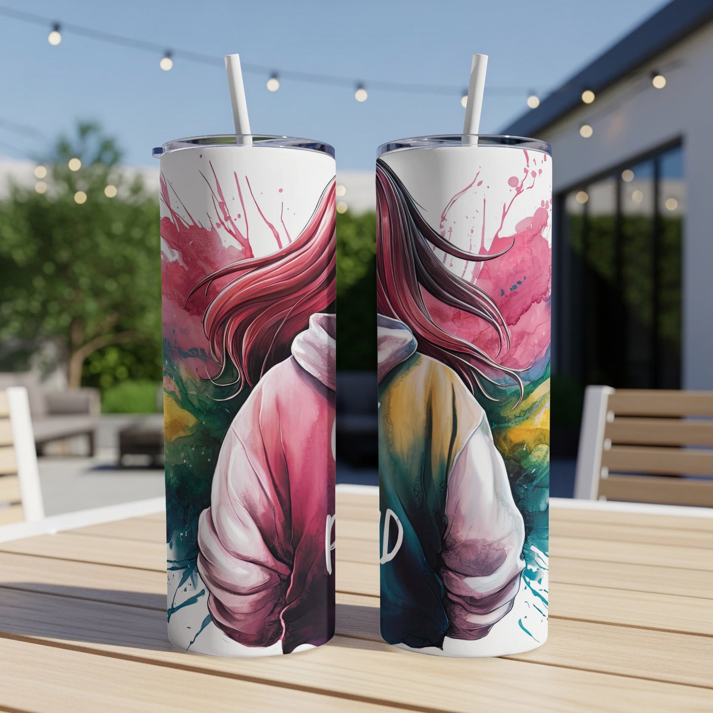 Two tumblers with abstract pink and teal paint splatter and a subtle rainbow effect.
