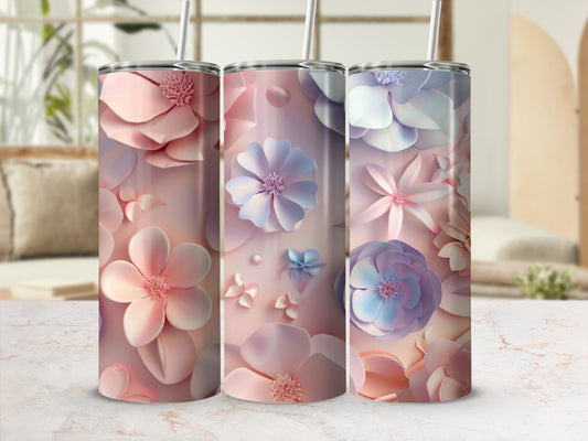 Three tumblers with delicate floral patterns in pastel pink, blue, and purple.