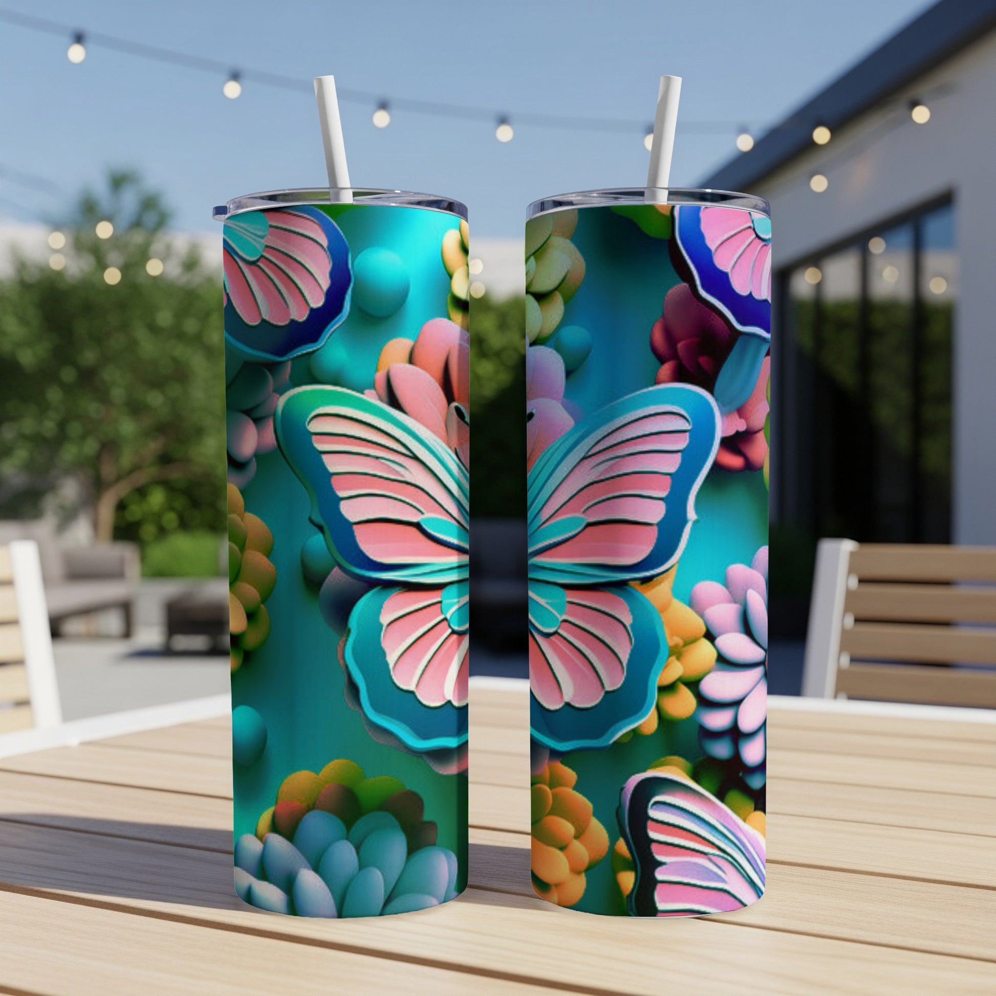 Two tumblers with a teal butterfly and succulent design.