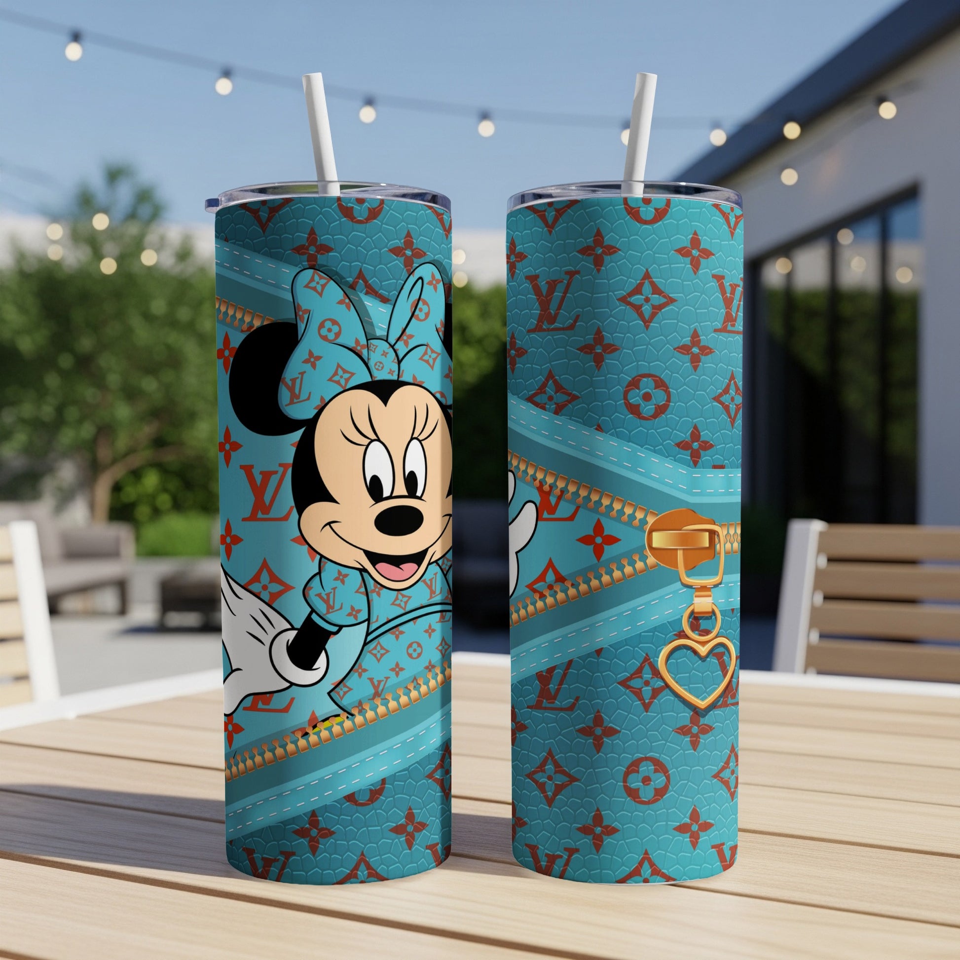 Minnie Mouse on a teal tumbler with LV-inspired pattern and gold zipper detail.