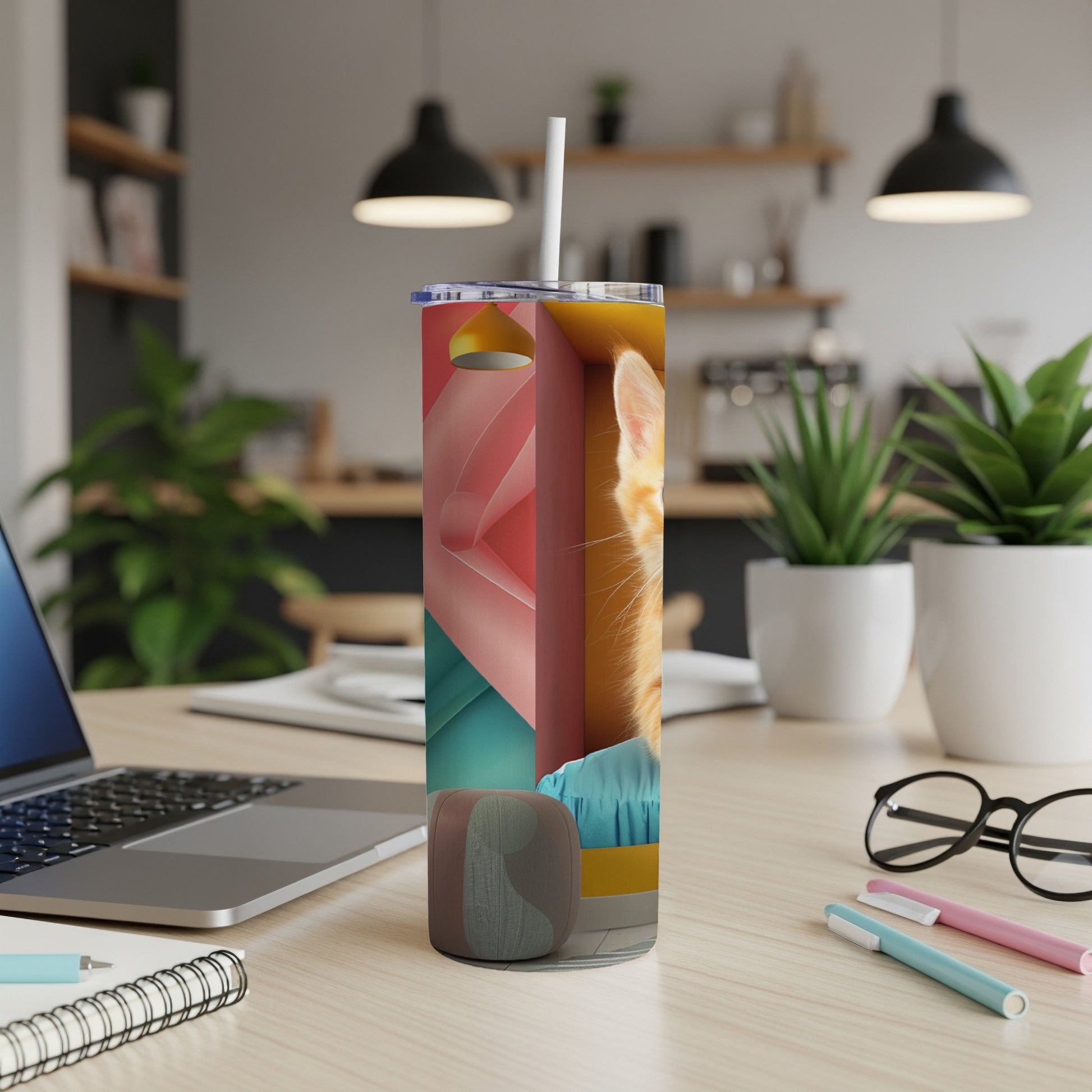 Cat peeking from behind abstract colorful shapes on a tumbler.