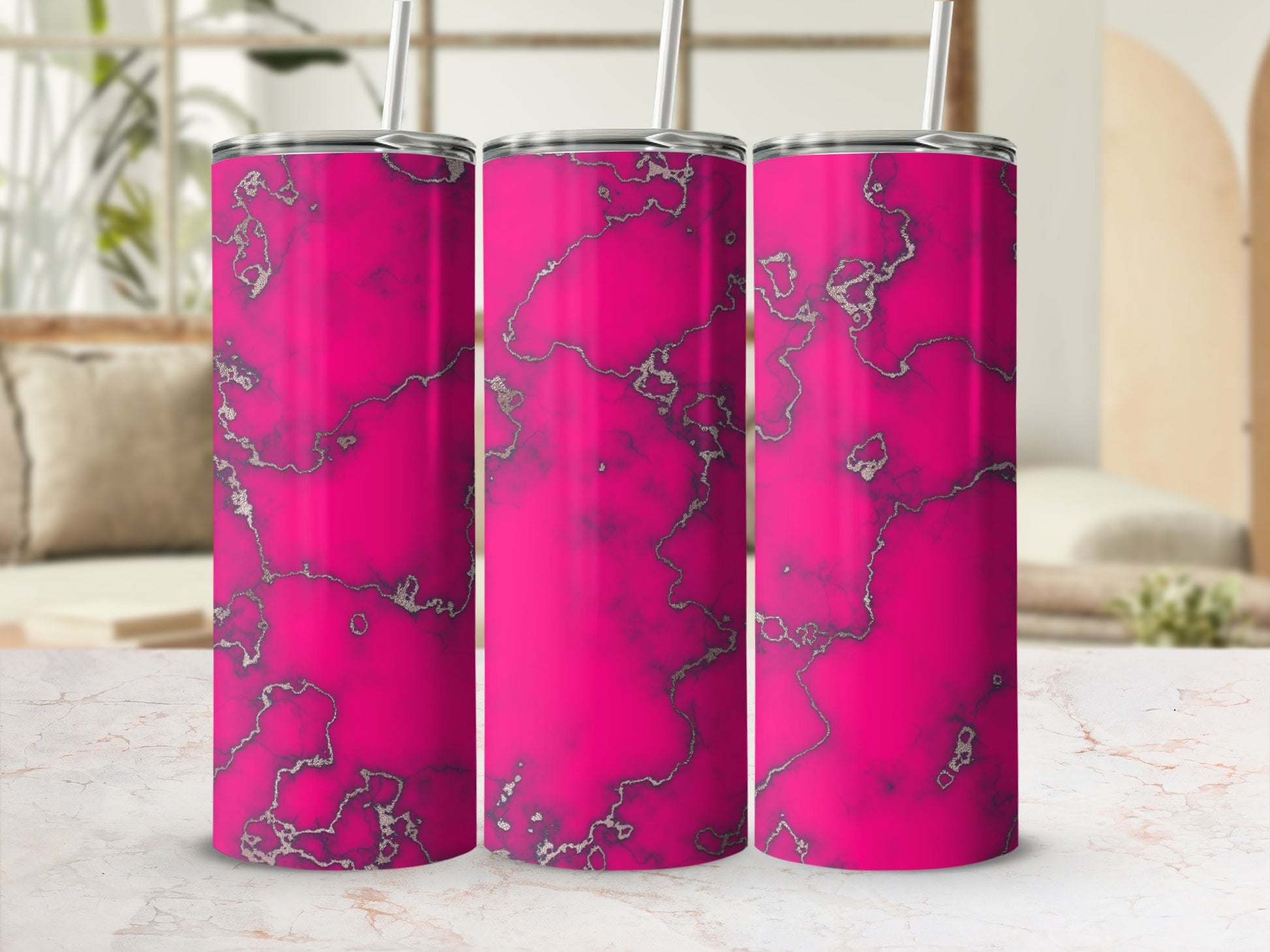 Three pink marble pattern tumblers with silver veining and straws.